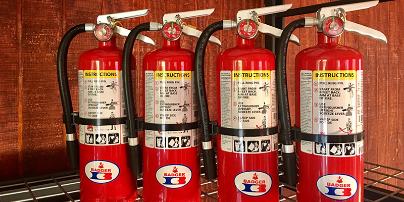 Group of Fire Extinguishers Ready to Be Installed