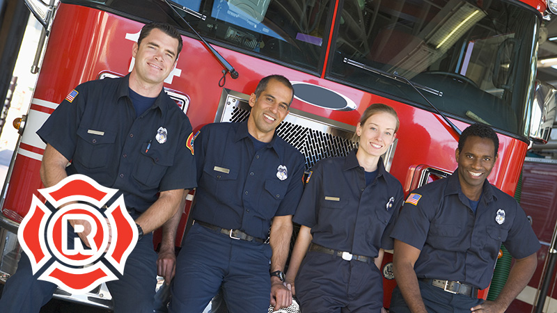 Firemen in Front of Fire Engine with Truss Sign